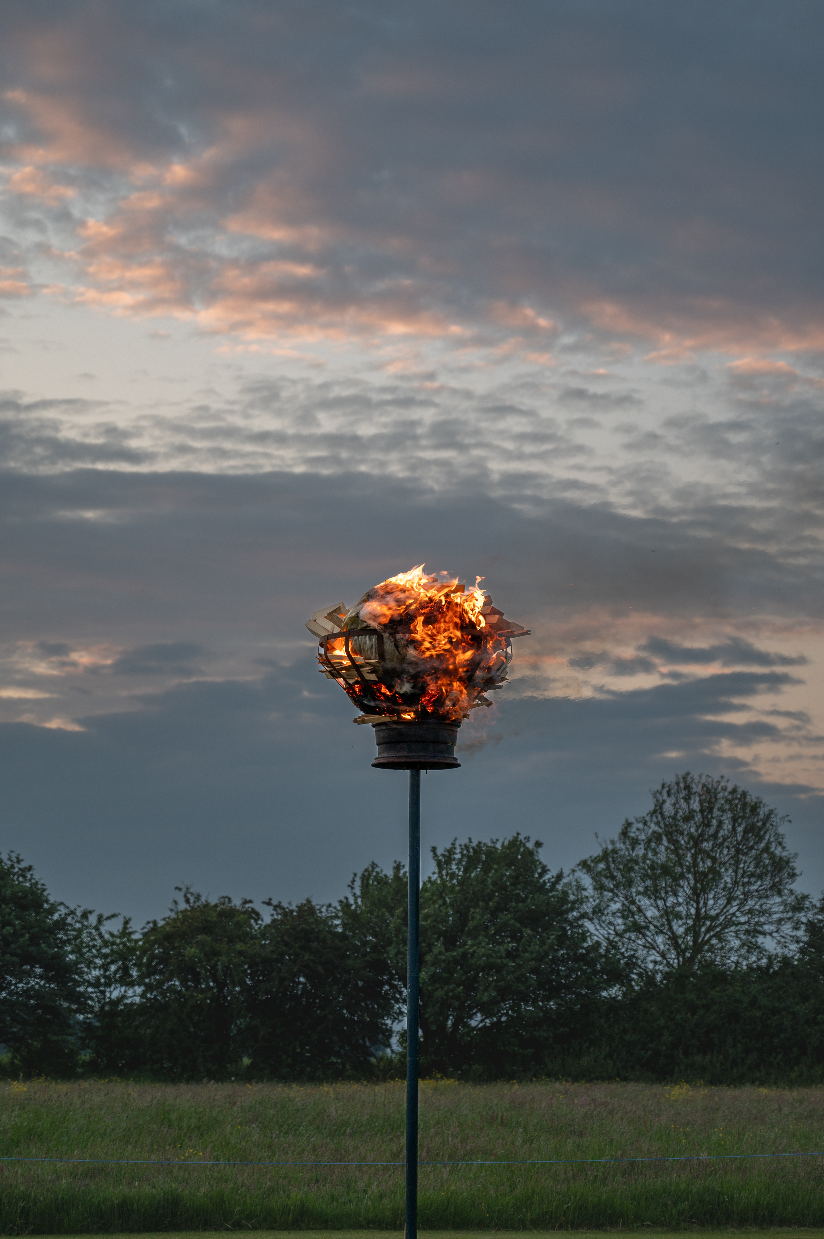 lighted beacon against evening sky at Beeford Playing Field