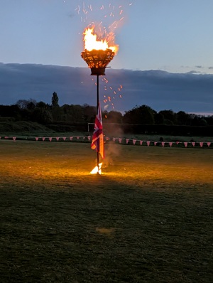 VE Day 80th Anniversary, burning beacon at the Playing Fields